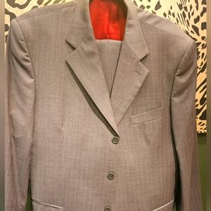 Men's imported designer suits, tailored and fitted.